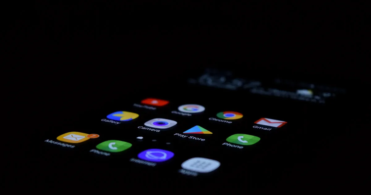 App icons on an Android phone’s Home screen in the dark